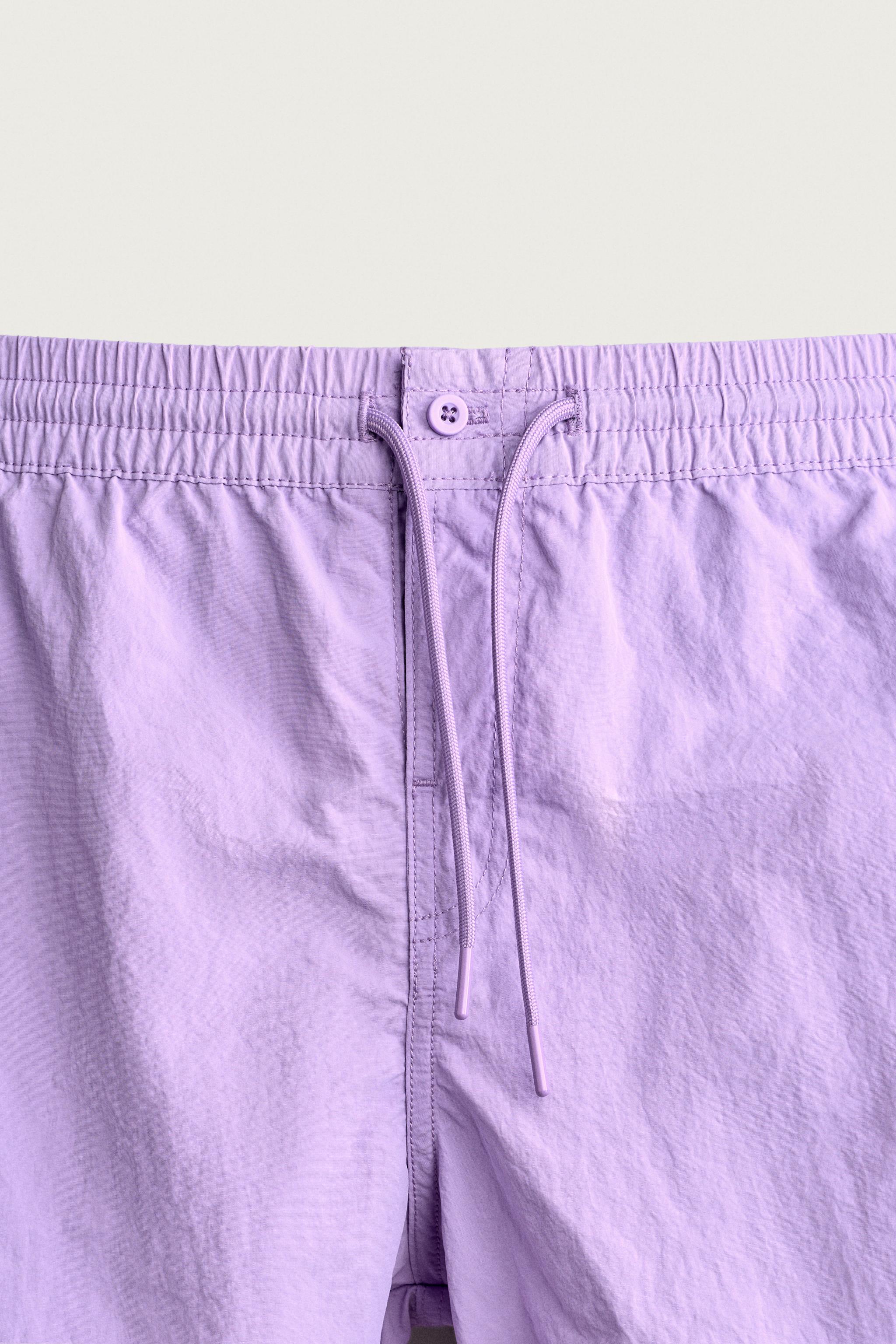 SHORT DE BAIN MI-LONG À FENTES